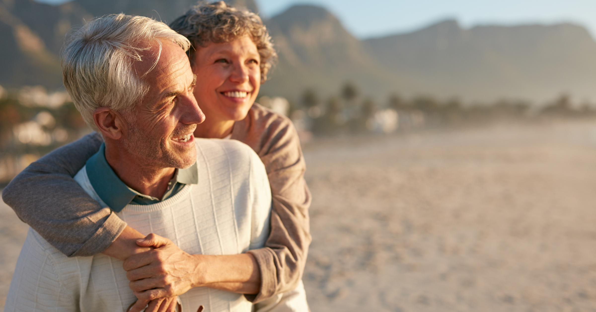 Happy older couple on the beach - Northern Way Assessing Long-Term Care Facilities